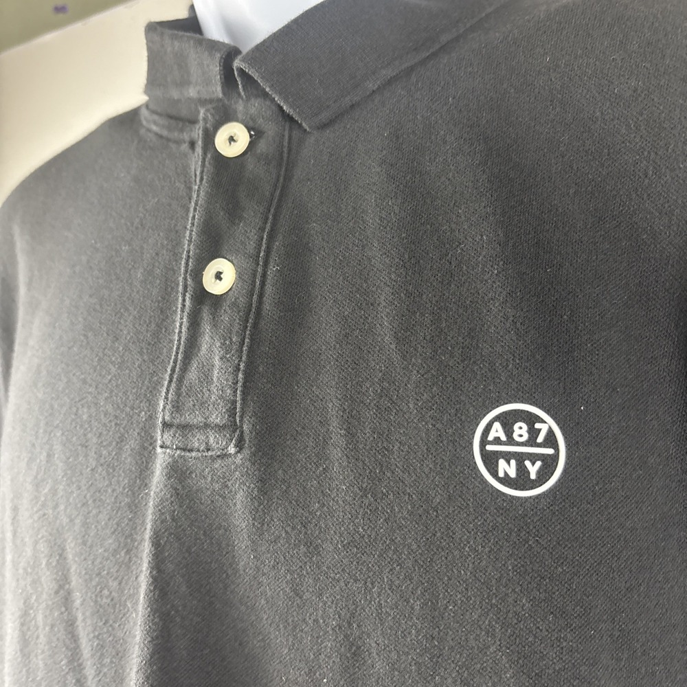 AEROPOSTALE A87 Polo Mens XL Black Short Sleeve Shirt White Logo Stretch Tagless
